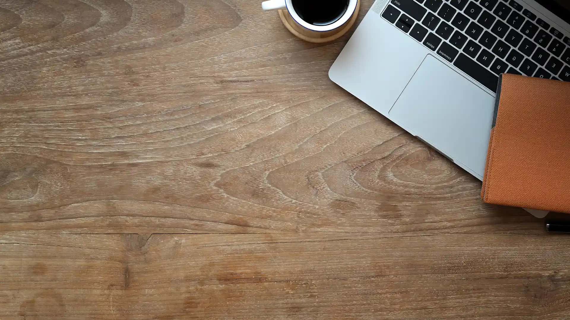 Desk with laptop and coffee