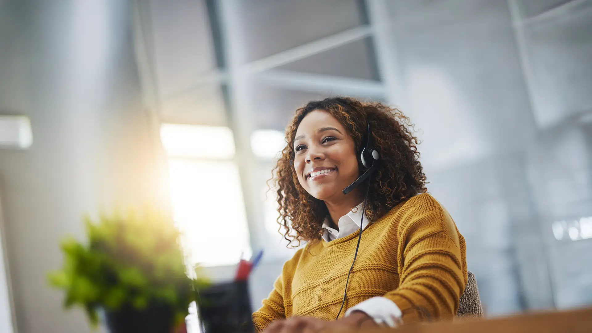 Woman smiling using headphones