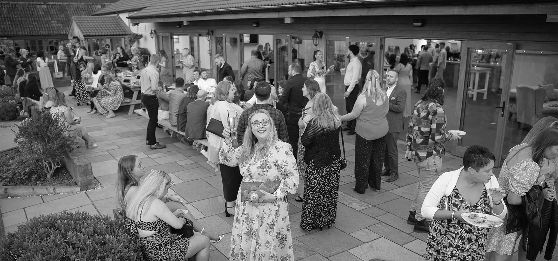 WPA employees enjoying drink and food at a patio