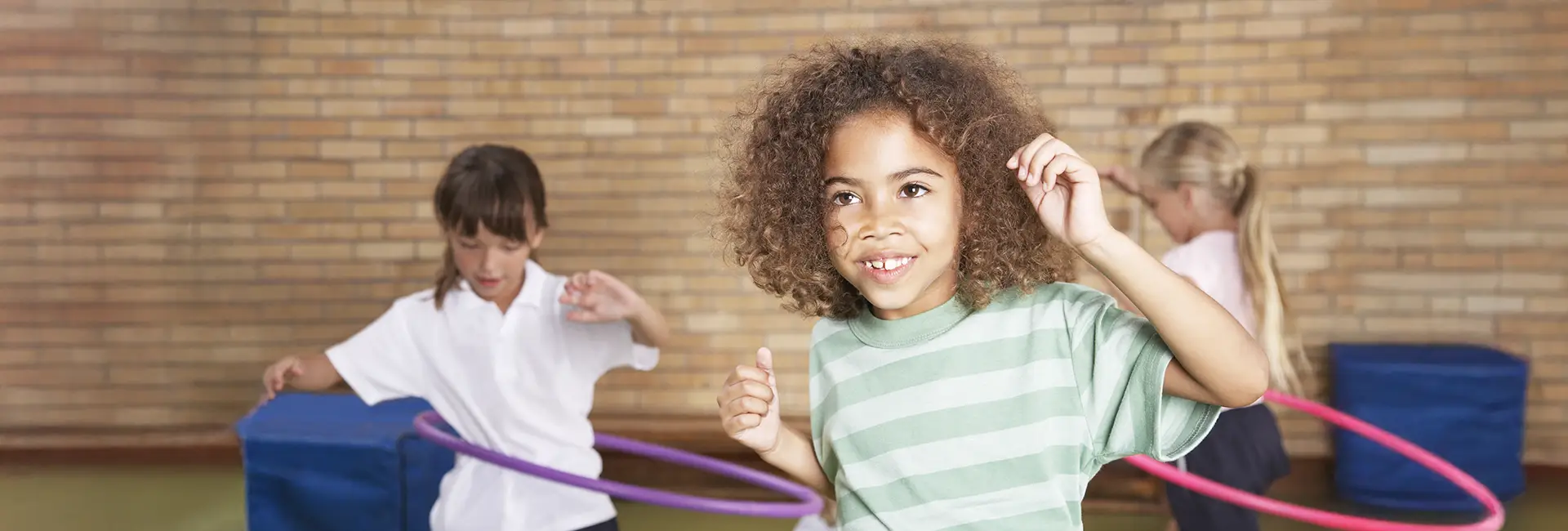 Girls hula hooping