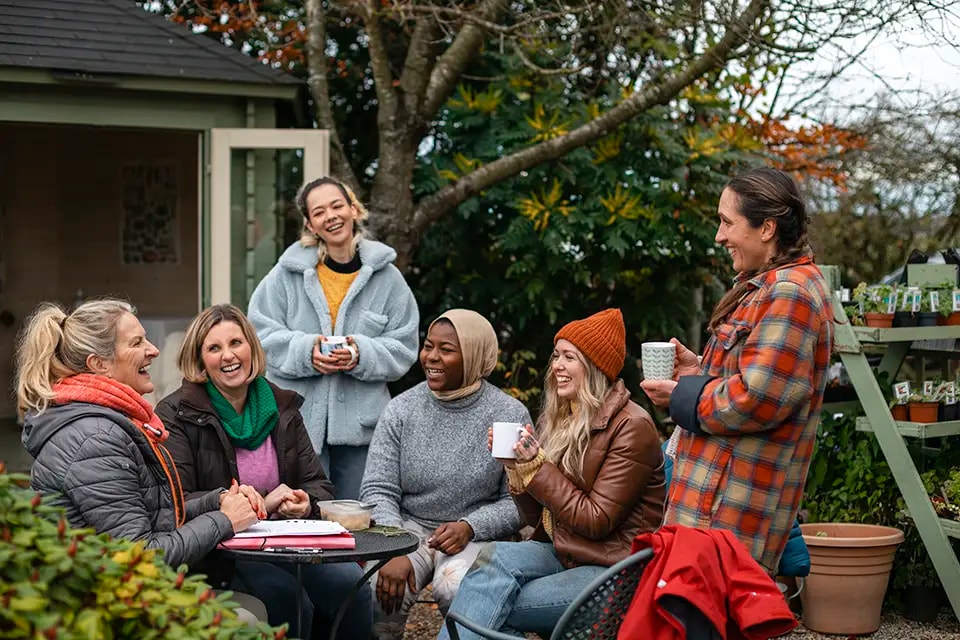 Group of people sitting outdoors