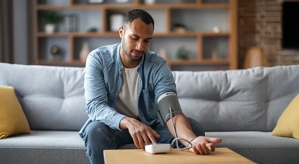 Man checking his blood pressure