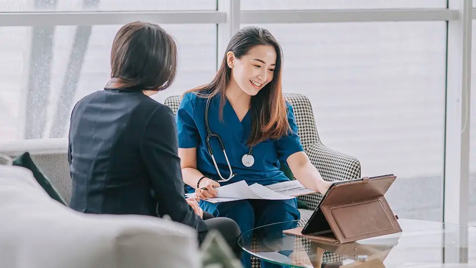Doctor talking with patient