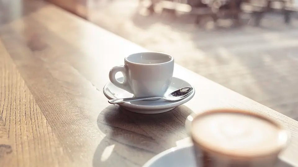 Coffee cup on a bench