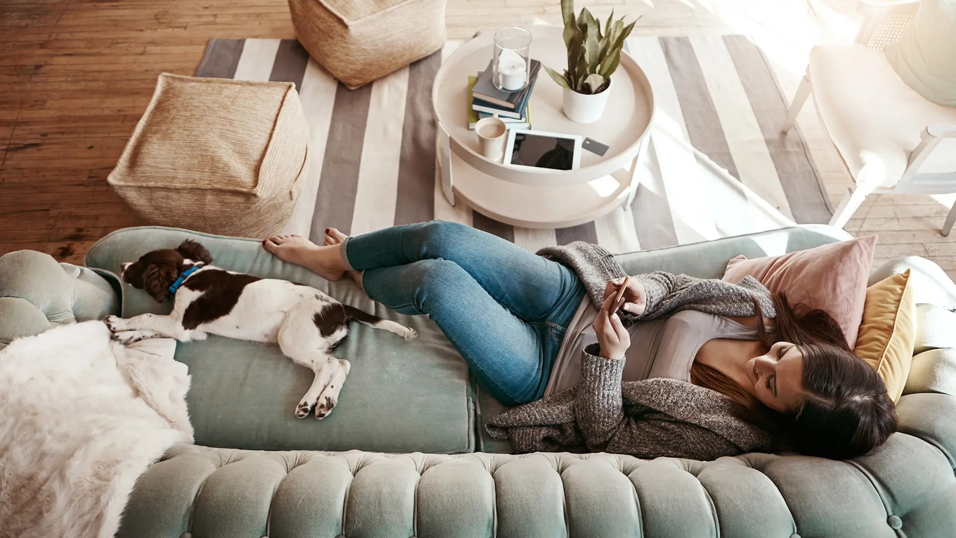 Lady on sofa with dog